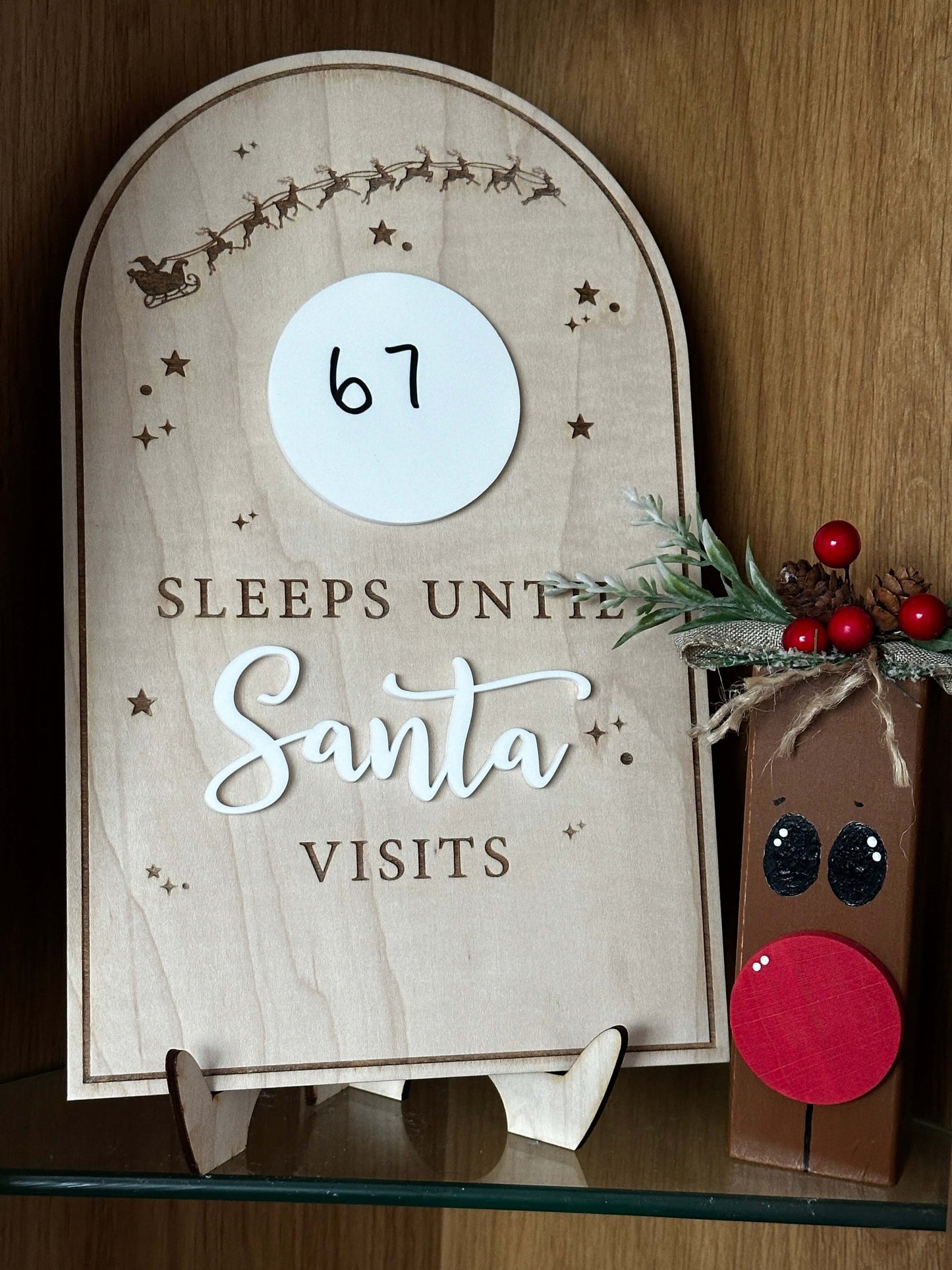 Engraved wood Christmas countdown board with acrylic circle to write the days on.