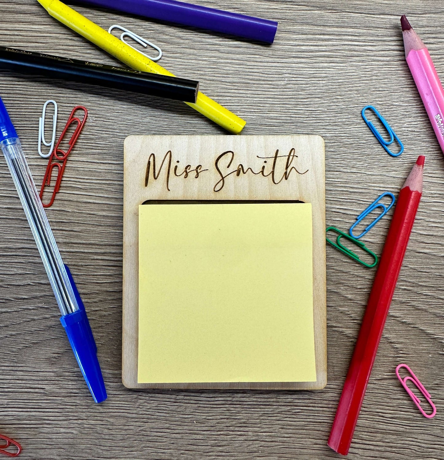 Wooden personalised post it note holder.