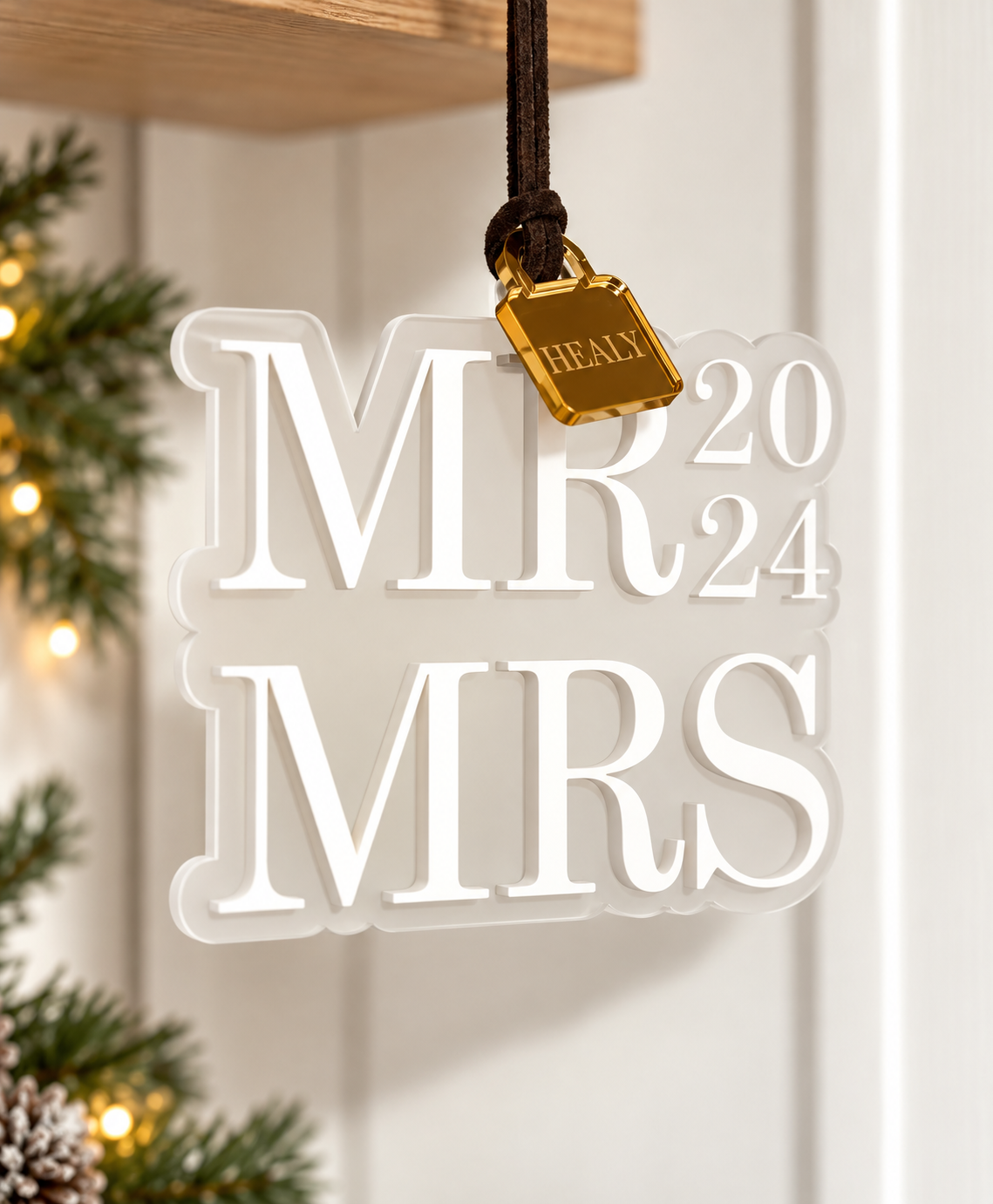 Personalised newlywed Christmas decoration with gold surname padlock
