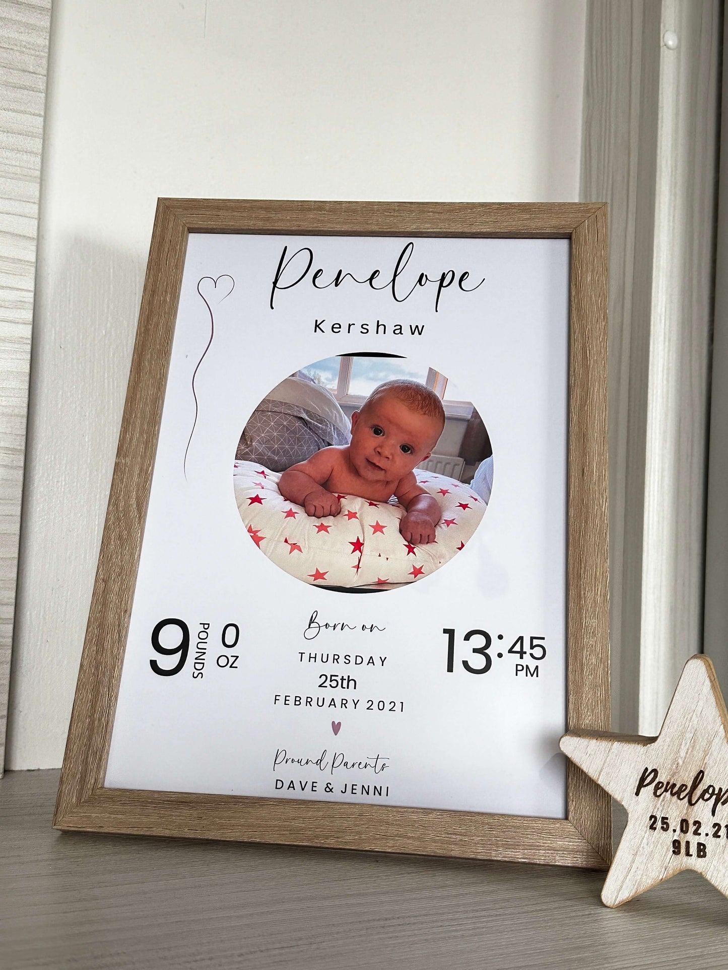 Personalised baby gift in a wooden photo frame with all the new baby information. 
