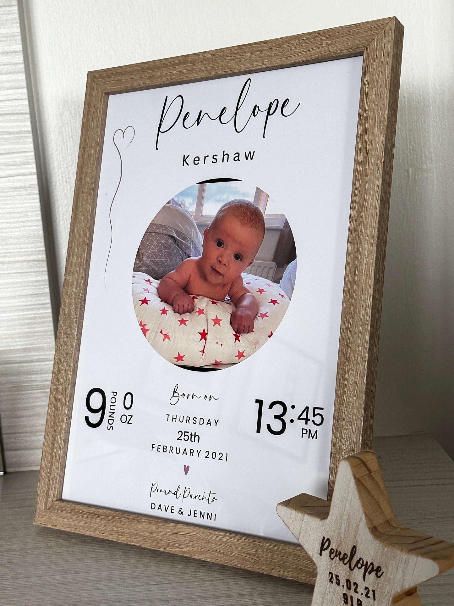Personalised baby gift in a wooden photo frame with all the new baby information. 