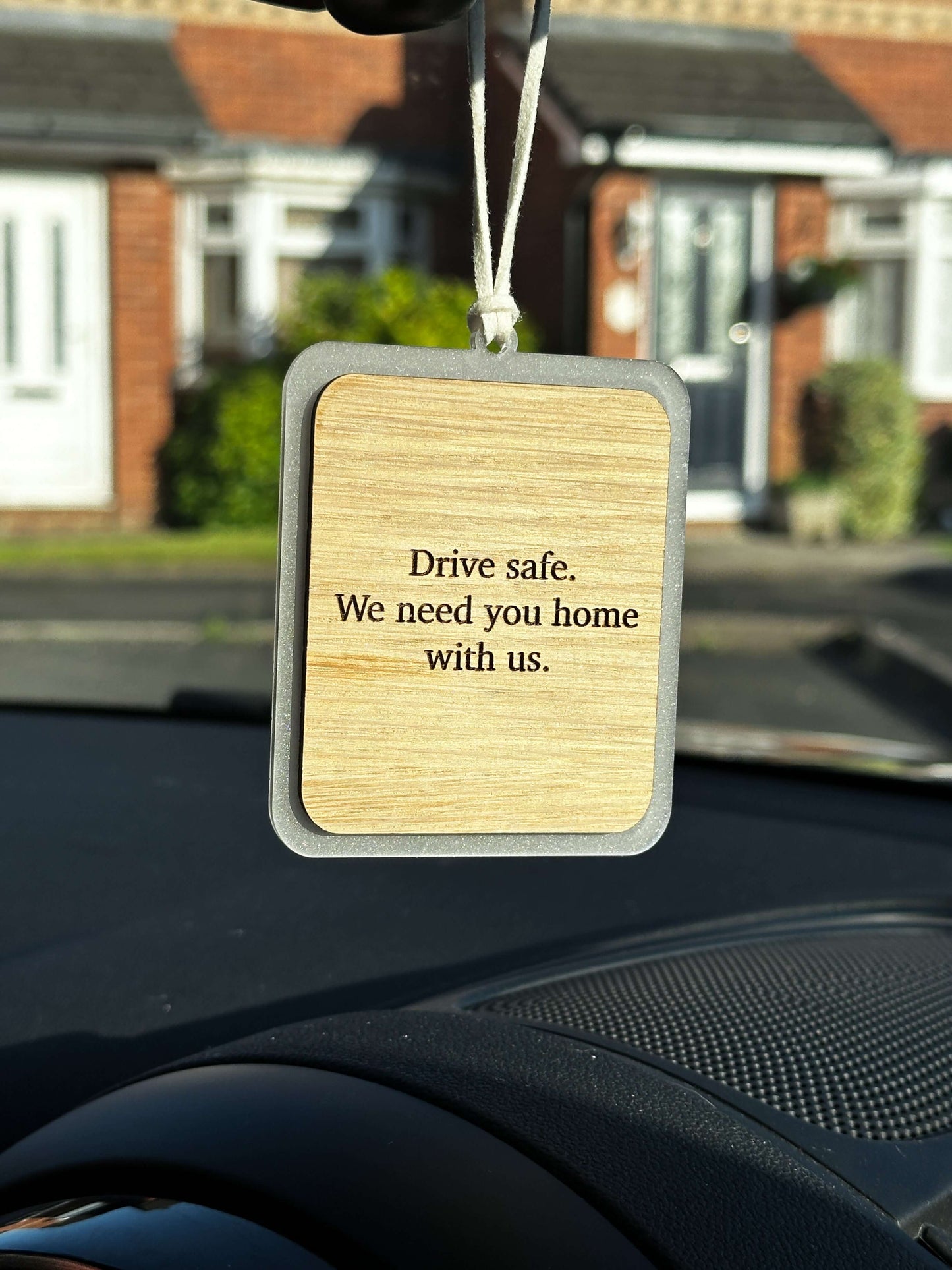 Wooden car hanging accessory including photo & engraving on the back.