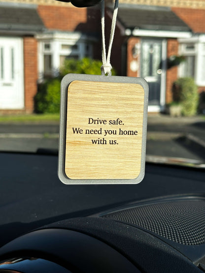 Wooden car hanging accessory including photo & engraving on the back.