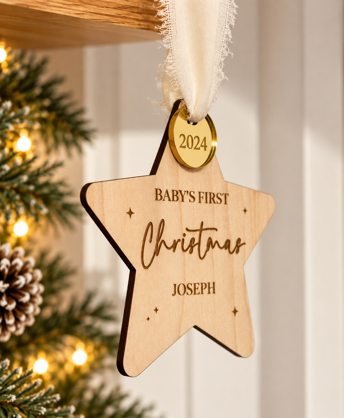 Personalised baby first Christmas keepsake star with engraved name and year