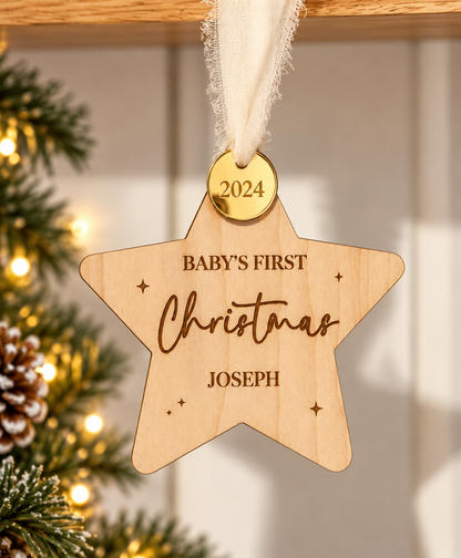 Personalised baby's first Christmas wooden star decoration with name and gold year charm