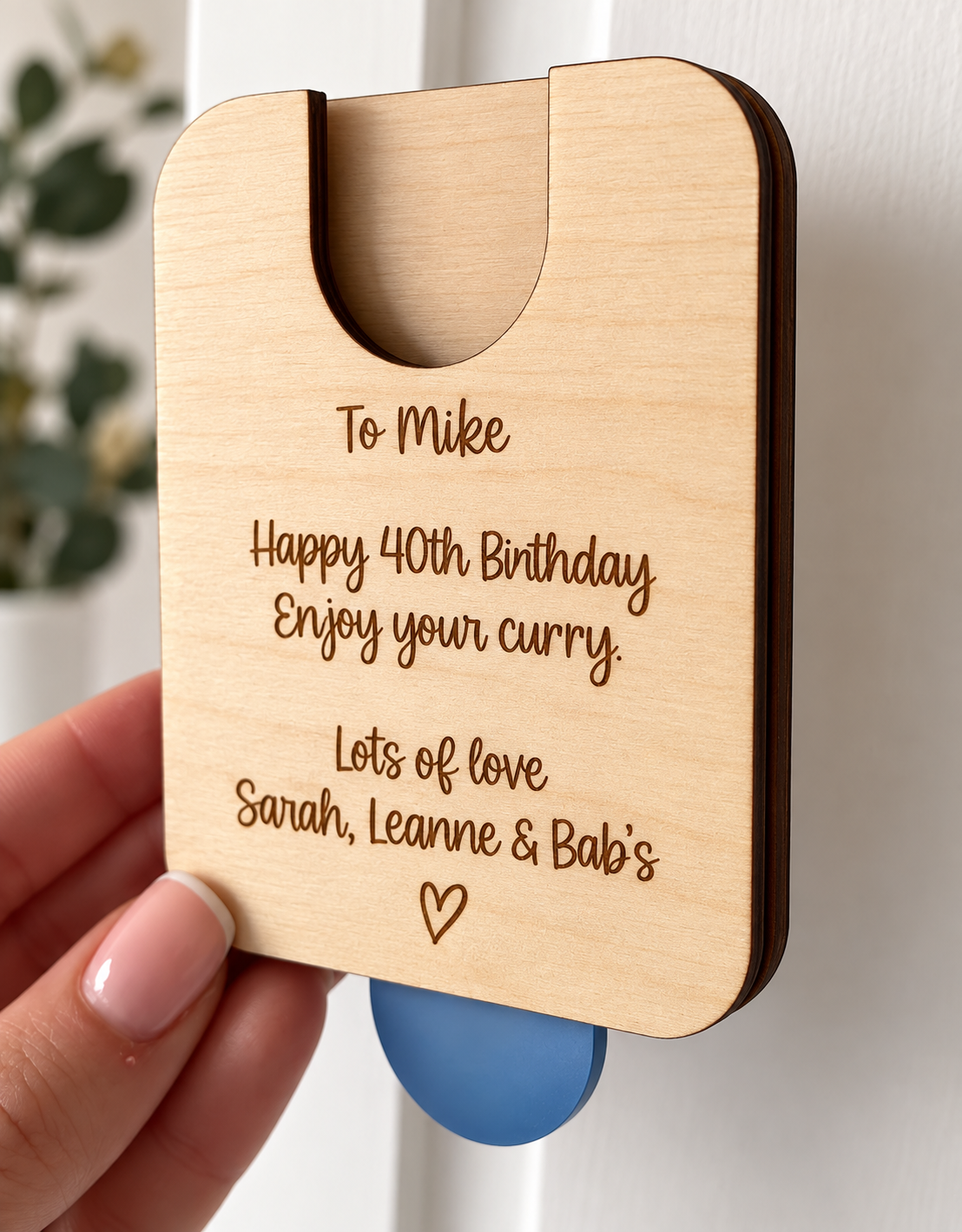 Back of personalised wooden birthday gift card holder with engraved message