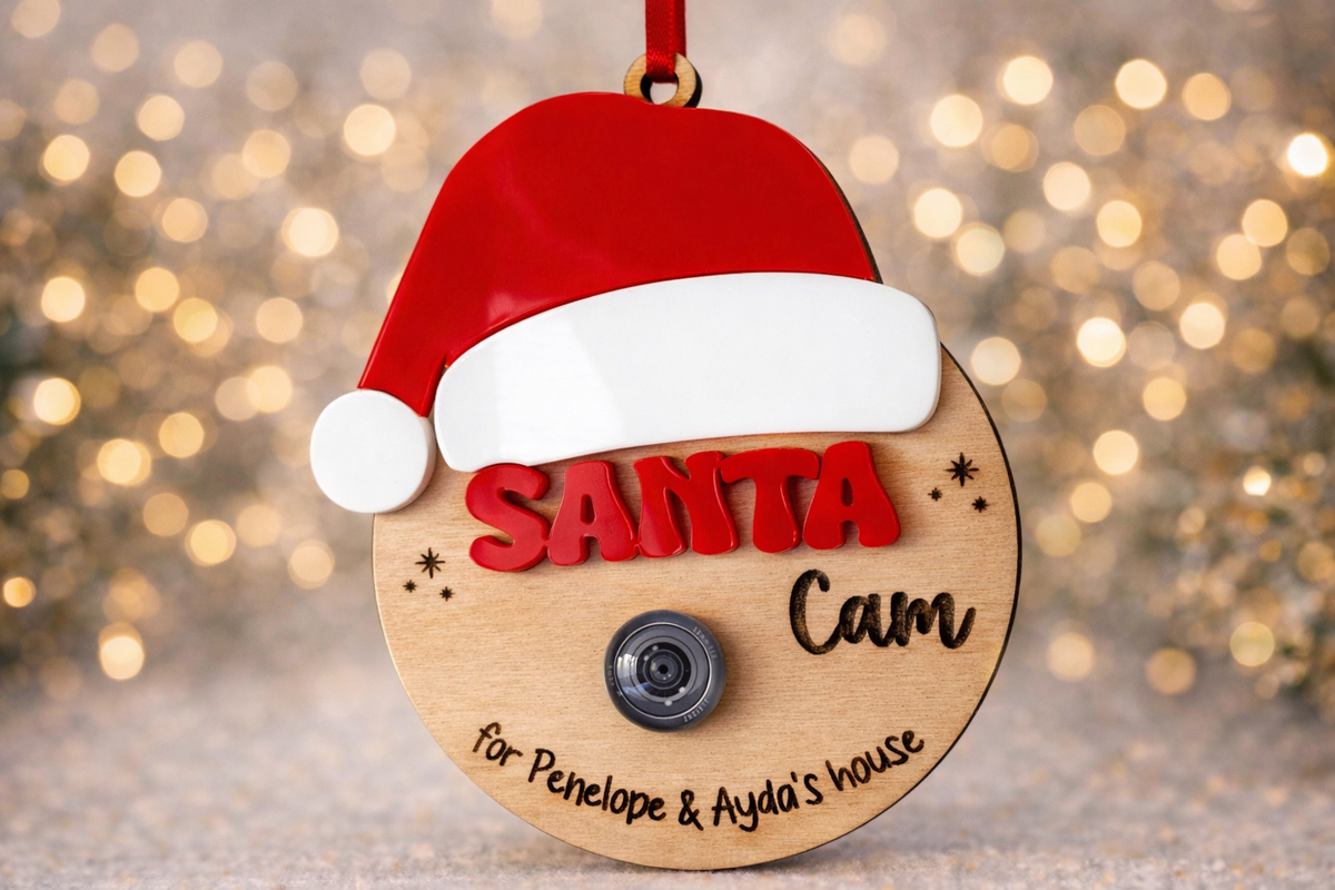 Personalised Santa Cam Christmas decoration with festive Santa hat and camera lens